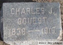 Charles J Oquest