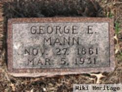 George E Mann