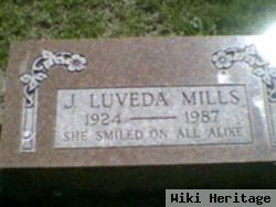 J Luveda Mills