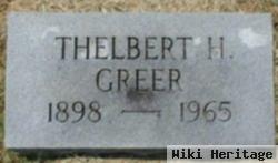 Thelbert H Greer