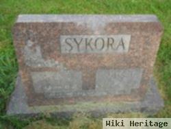 Joyce E. Sykora