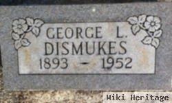 George L Dismukes