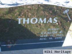 Claude R. Thomas