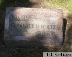 Clarence M Holtz