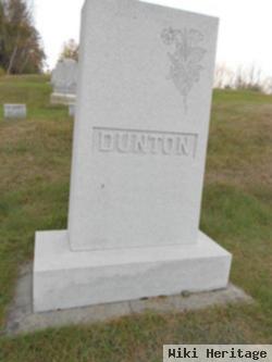 Arthur J Dunton