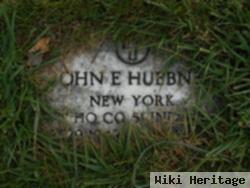 John E Huebner