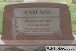 Olga M Carlson