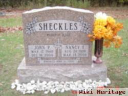 John P Sheckles