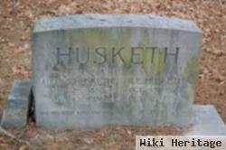 Ralph E Husketh