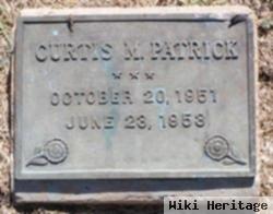 Curtis M Patrick