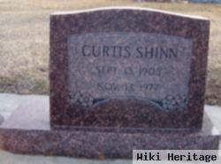 Curtis A. Shinn