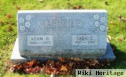 Adam H Greer