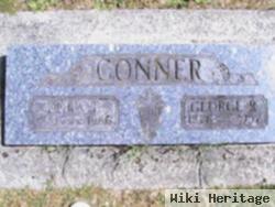 Dora T Conner