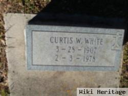 Curtis W White