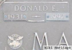 Donald E. Madkins