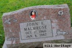 John E Malmrose