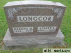 Albert L Longcor