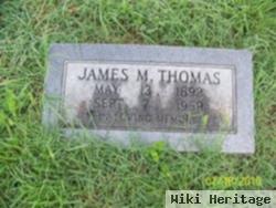 James M Thomas