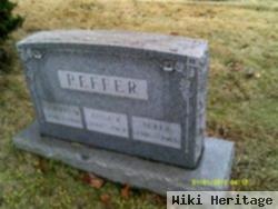 Dr John M Peffer