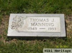 Thomas J Manning