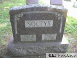 John J Soltys