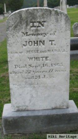 John T White