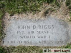 John D Riggs