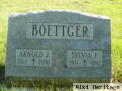 Arnold J Boettger