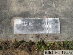 James M White