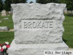 Olan H Brokate