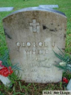 George J White