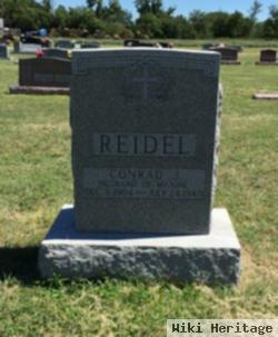 Conrad J Reidel