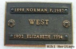 Norman P West