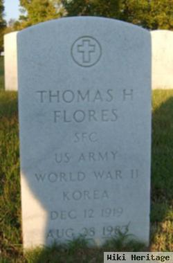 Thomas H Flores