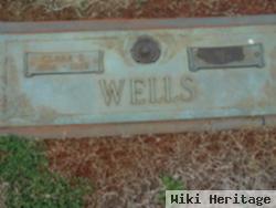 W Russell Wells