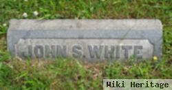 John S White
