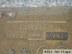 Curtis J. Collins