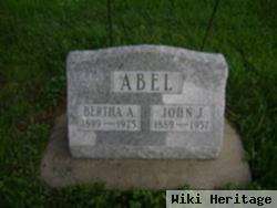 John J Abel