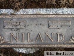 William E Niland