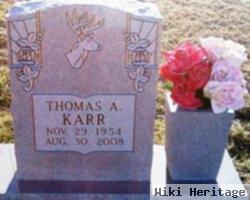 Thomas A Karr