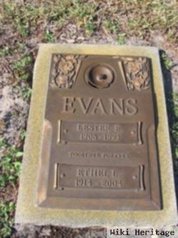 Lester E Evans