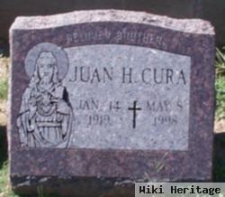 Juan H Cura