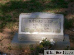 Maynard L Cox