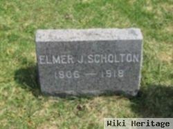 Elmer J Scholton