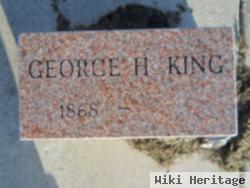 George H King