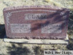 O. Cora Clay