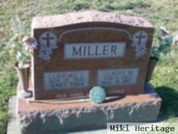 Clifford E Miller