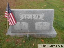 Elmer J. Segear