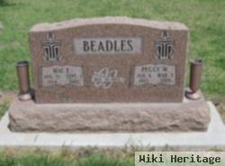 Mac E. Beadles