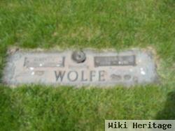 Albert E Wolfe